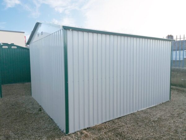 A rear view of the Colossus Shed in white-grey