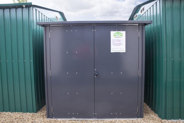 steel bike storage from sheds direct ireland. It is grey, with two doors, which are both closed. The view is from the front on, so you cannot see the depth.