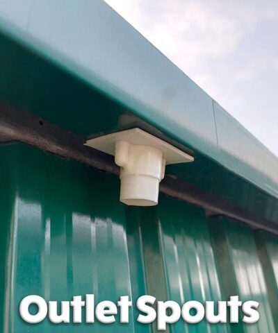 The outlet spouts on the green steel garden shed.