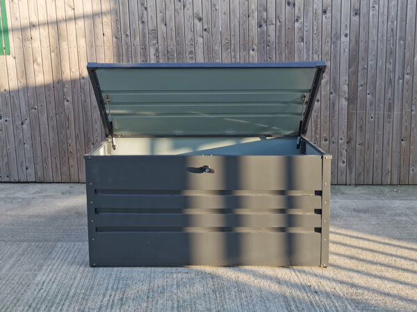 The Garden Storage box from Sheds Direct Ireland with the steel lid open and a partial view of the inside of this large unit.