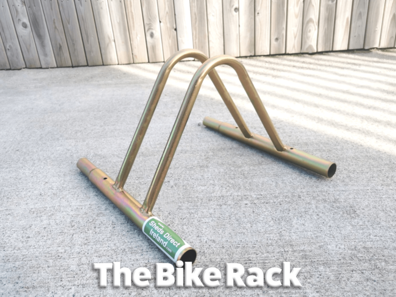 The bike rack add on for steel sheds. It's small, golden coloured and has a green sheds direct ireland sticker on it