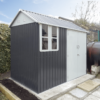 The 8ft wide x 6ft deep steel cottage shed in a beautiful garden