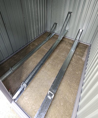 Inside the bike shed showing the tyre tracks