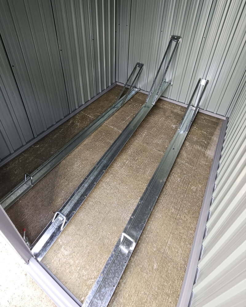 Inside the bike shed showing the tyre tracks