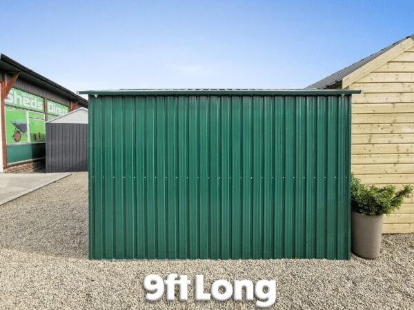 the side view of the 6ft x 9ft steel garden shed in green. It reads '9ft long' in white text under the shed