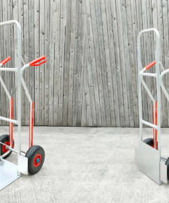 Two of the aluminium hand trucks side by side - one has the plate open and the other has it closed.