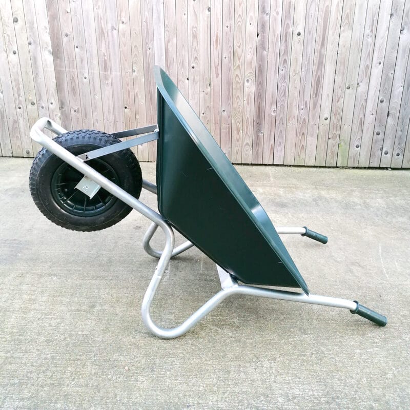 100L Wheelbarrow in a prone position, resting on it's handles