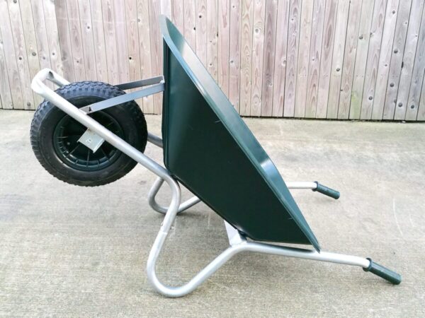 100L Wheelbarrow in a prone position, resting on it's handles
