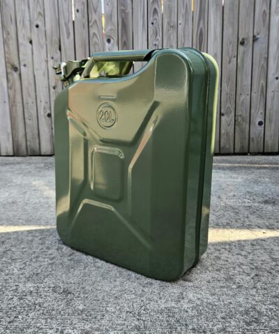 The 20L Jerry Can in green against a wooden panel wall