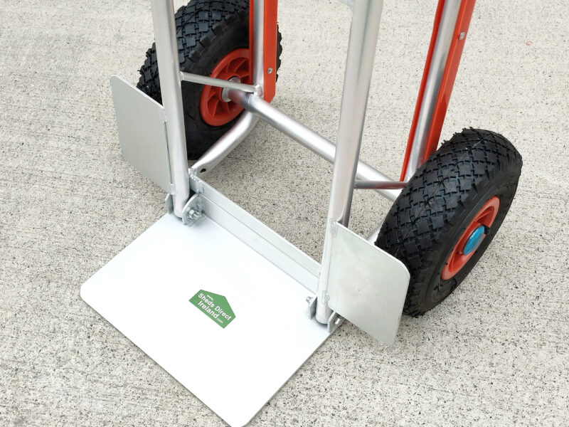 Top down view of the footplate that folds on the handtruck