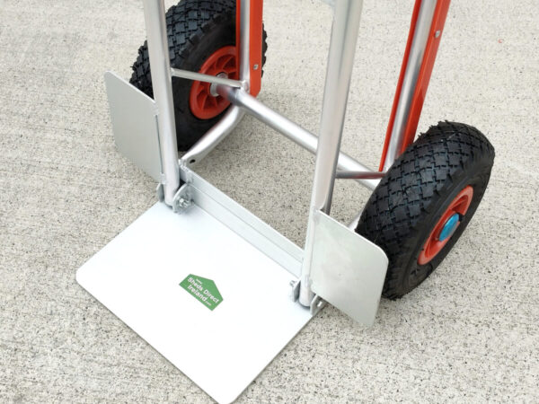 Top down view of the footplate that folds on the handtruck