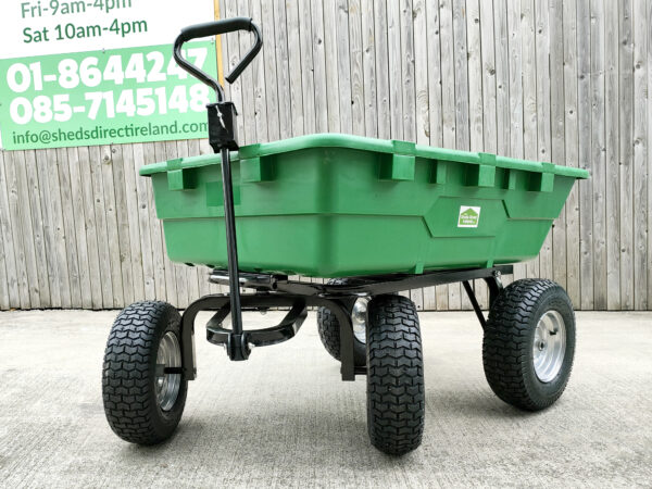A 45 degree angle view of the 250L Tip cart. It is green and it has four black rubber-looking tyres. The handle is standing vertically independently from the frame