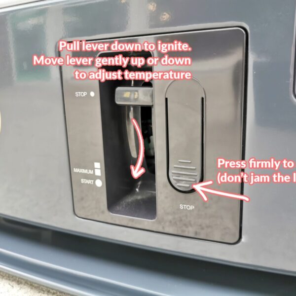 A close-up view of the on/off controls and temperature lever. It has text which reads: 'pull down lever to ignite. Move lever gently up or down to adjust temperature' and 'do not jam the lever up to turn off, use off button instead'