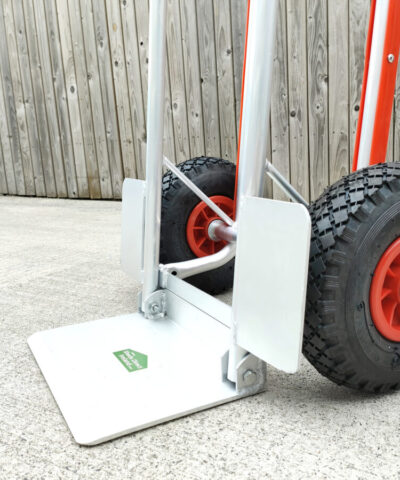 The side view of the hand truck with fold down footplate