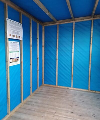 The internal membrane lining of the cabin shed. It is a bright, royal blue.