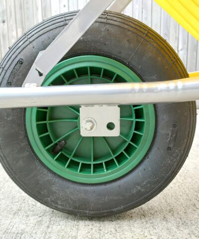 The black-grey tyres on the 90L wheelbarrow with a green alloy centre and thick silver bars connecting it to the tub