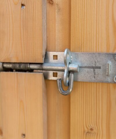 The external lock on the wooden bike store