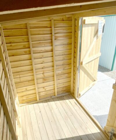 An inside view of the wooden bike shed