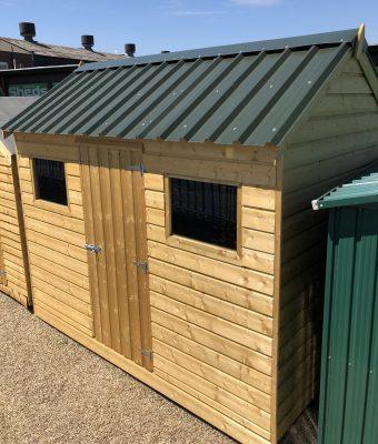 A wooded shed with a steel roof on the Sheds Direct Ireland showroom