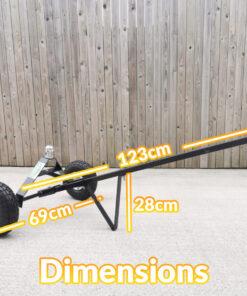 The Trailer Dolly with the Dimensions written on top. It is 123cm long, 69cm wide, the standing support bar is 28cm tall and the wheels are 25cm in diameter