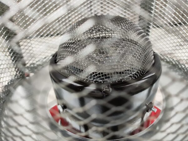 The mesh dome grate on the inside of the camping stove heater