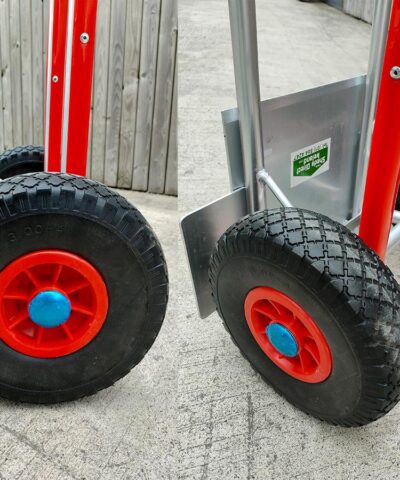 A close up detailed view of the solid wheels on the aluminium hand truck with folding footplate