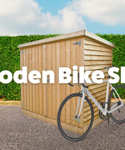 The Wooden Bike Shed seen from the right hand side. big bold text that reads wooden bike shed. a white bike leans onto shed