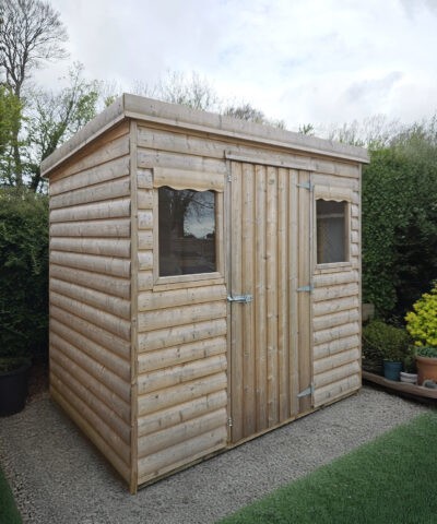 A wooden cabin shed