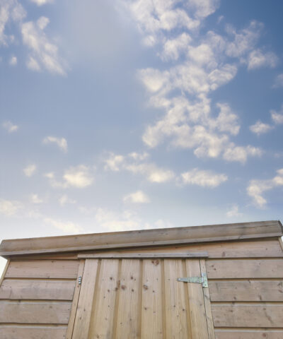The sloped roof at the front of a cabin shed