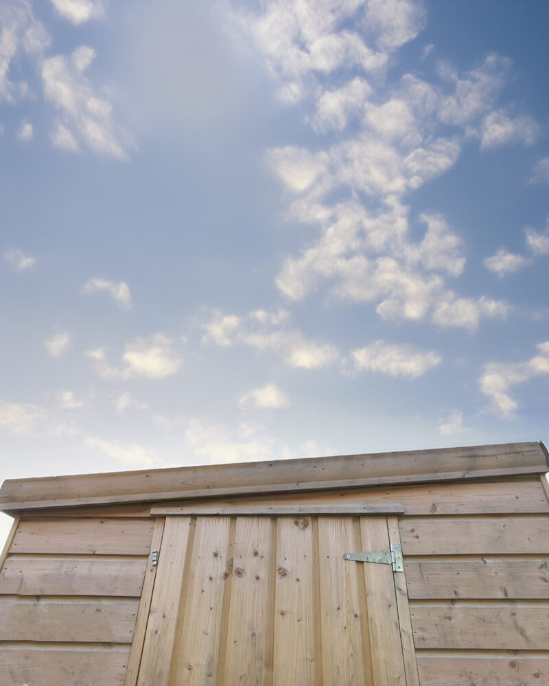 The sloped roof at the front of a cabin shed