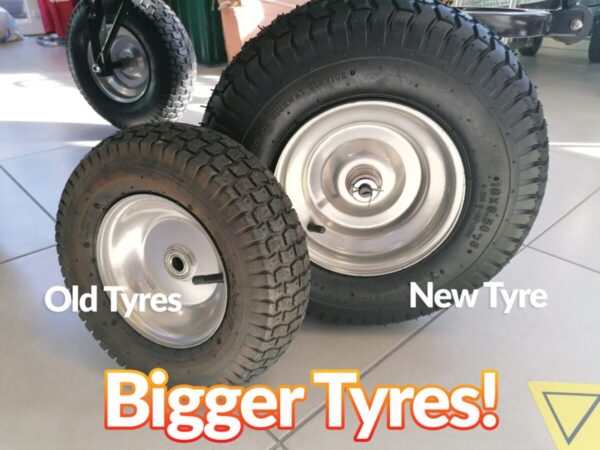 The new, bigger tyres of the 250L cart beside the old tyres. They are approximately twice the size