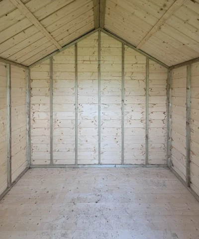 The inside of a wooden lodge shed