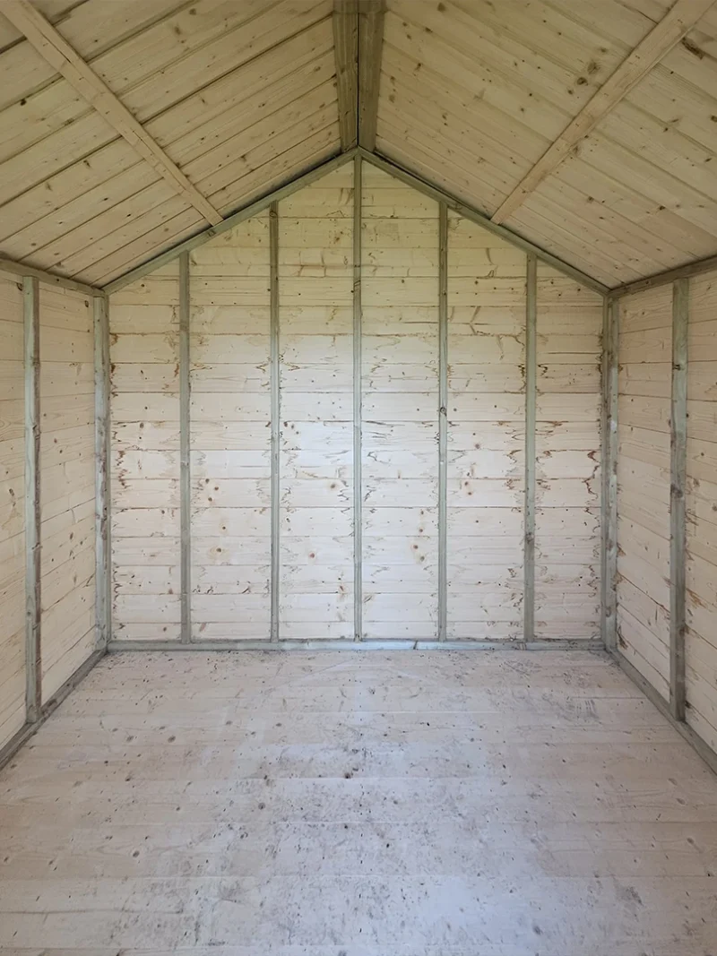 The inside of a wooden lodge shed