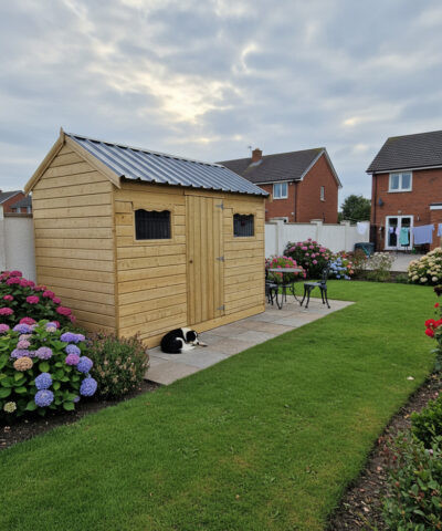 A wooden cottage shed in a garden in Louth