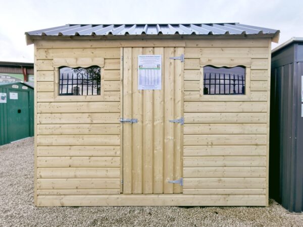 The 10ft x 6ft Wooden Cottage Shed with a steel roof on the Sheds Direct Ireland lot in Dublin.