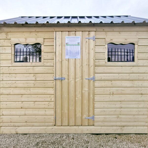 The 10ft x 6ft Wooden Cottage Shed with a steel roof on the Sheds Direct Ireland lot in Dublin.