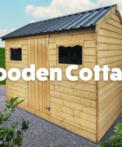 Wooden cottage shed. outside in gravel. light brown in colour.