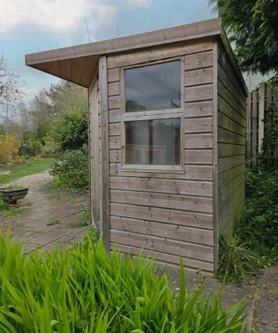 Side exterior of the Corner Shed