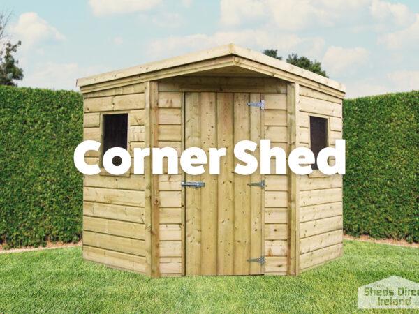 a corner shed, against two walls in an Irish back garden. There are flowers in the foreground and a chair to the side of the shed. The shed is unusual in shape, as one corner appears to have been cut off. The door is on this truncated corner, with 2 windows, one on either side of the door.