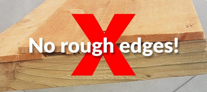 A warning picture showing a large red 'x' across a picture of rough, rustic wood. It reads 'no rough edges' on top of the X.