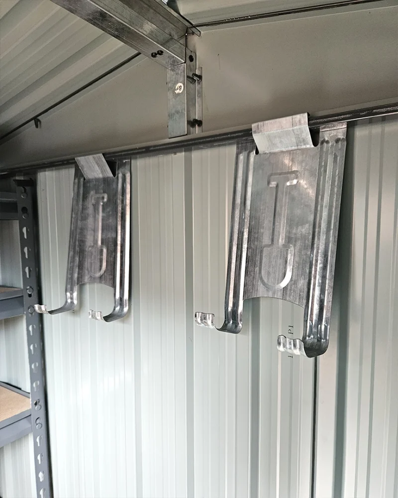 the included tool hooks up on the wall