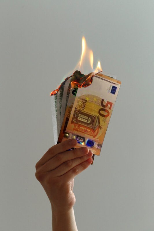 Wasting Money by literally burning it!