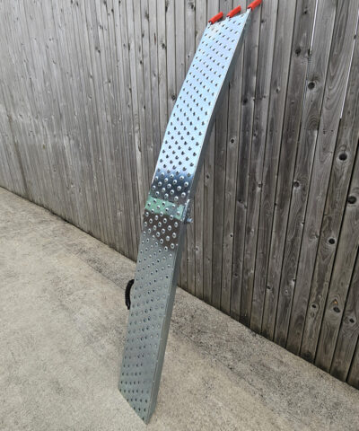 The folding ramp open and from the side