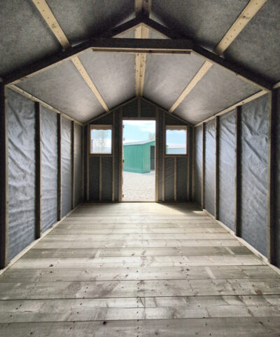 Inside the tall, extra-long shed, looking outwards