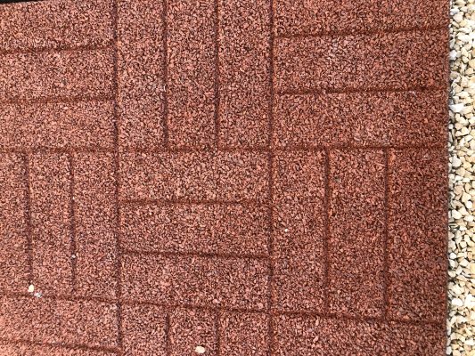 Alternative to concrete base - this is suitable to lay a shed onto also. It's a spongy, thick faux-concrete material