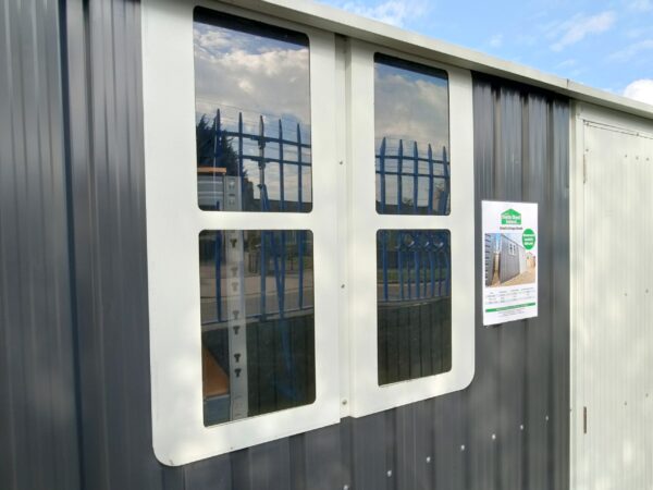 A closer view of the window as seen from the outside of the steel cottage shed