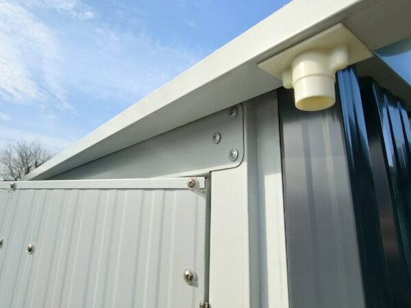 The outlet spouts on the cottage garden shed