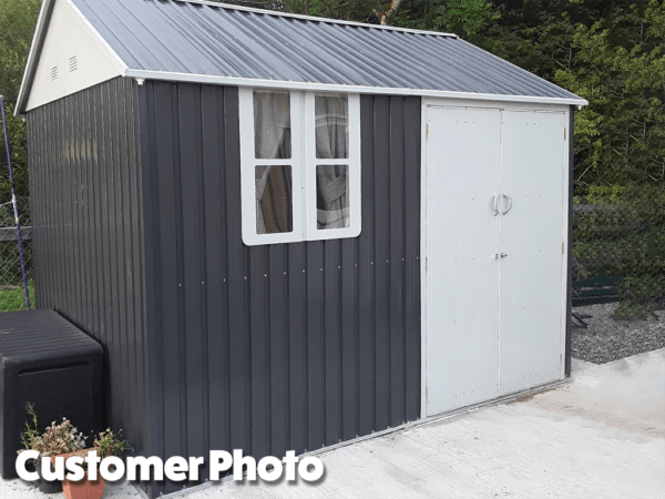 A customer's photo of the cottage shed. It has curtains inside
