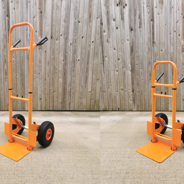 The collapsible hand truck from Sheds Direct Ireland as seen in two photographs side by side. The unit is bright orange, with black wheels and blue wheel caps. There is a shiny, silver spring suspension system visible from the side. The photo on the left shows the product at it's tallest, while the one on the right has been compacted.
