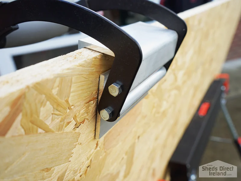 The back of the panel carrier with the grip attached
